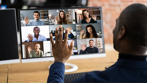 Blog Post Thumbnail: a virtual call with multiple people waving