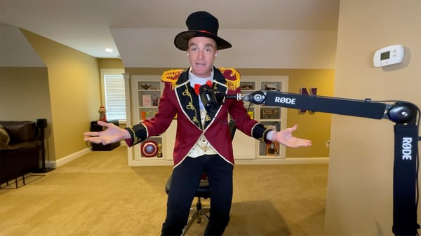 Blog Post Hero: a man dressed as a circus ring leader