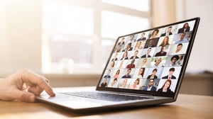 Blog Post Hero: a laptop close up of a video call with many people