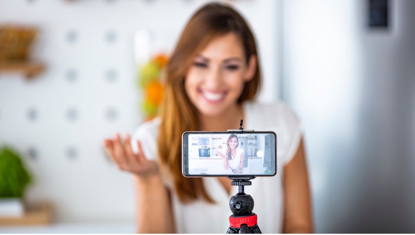 a woman recording herself