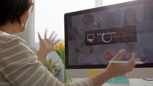 Blog Post Hero: a woman on a zoom call suffering from a poor connection