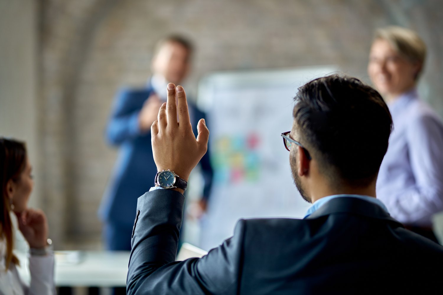 Businessman raise hands